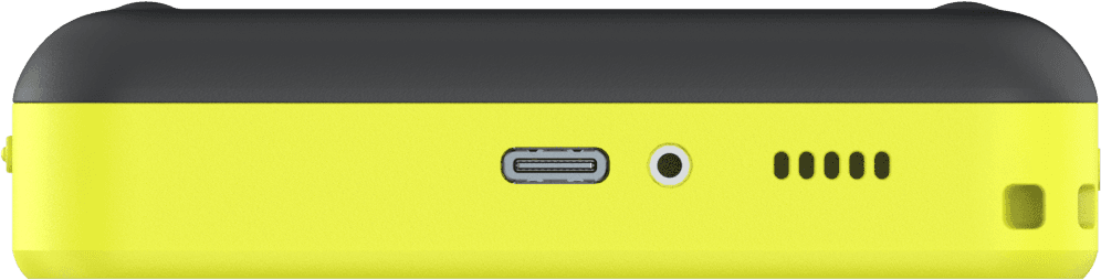 Teya Lite along the edge carrying its USB-C port, headphone jack and speaker, showing how thin it is